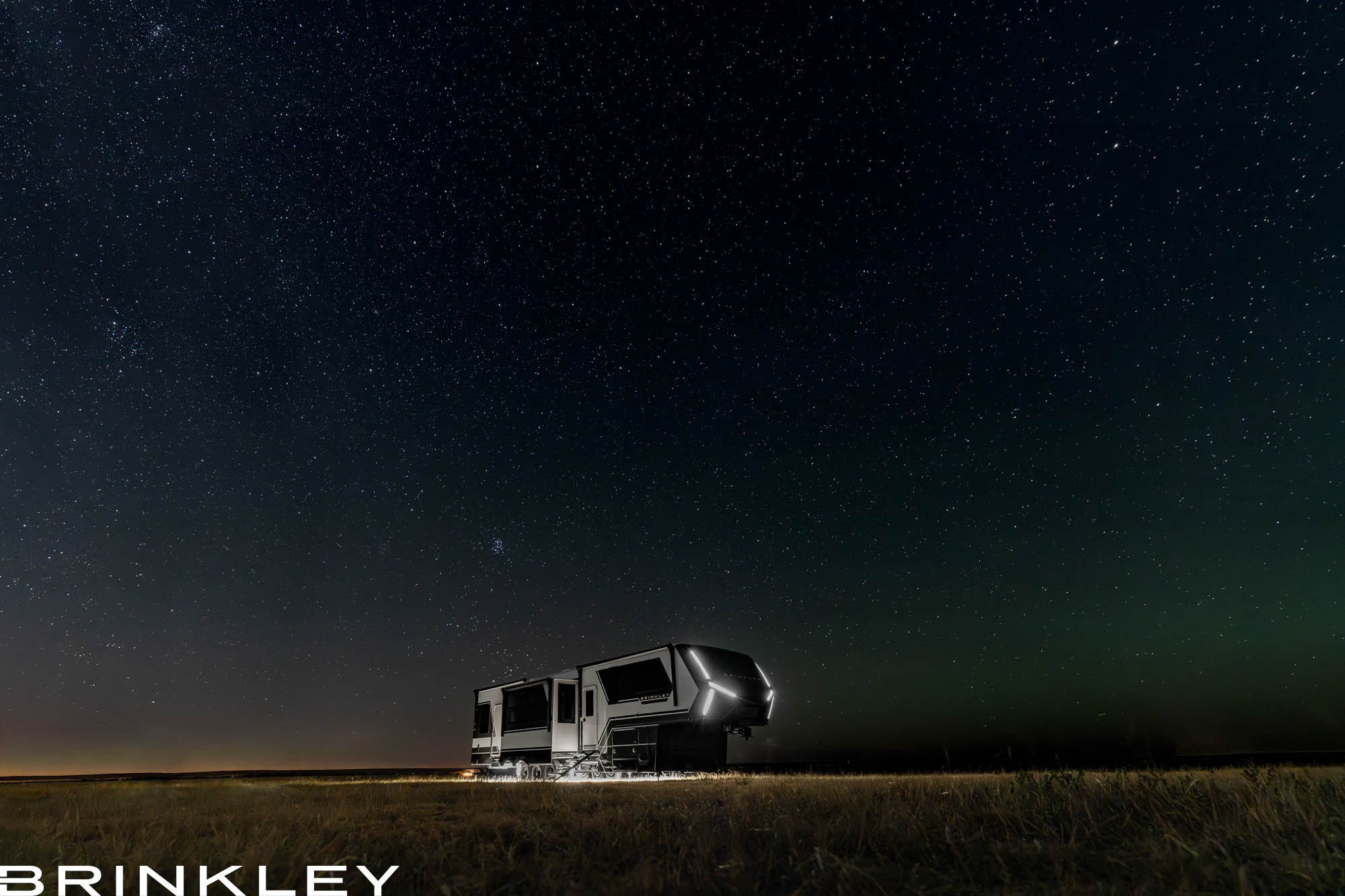 Brinkley Model G Luxury Fifth Wheel Toy Hauler in Premium Exterior under the Stars Camping in Texas