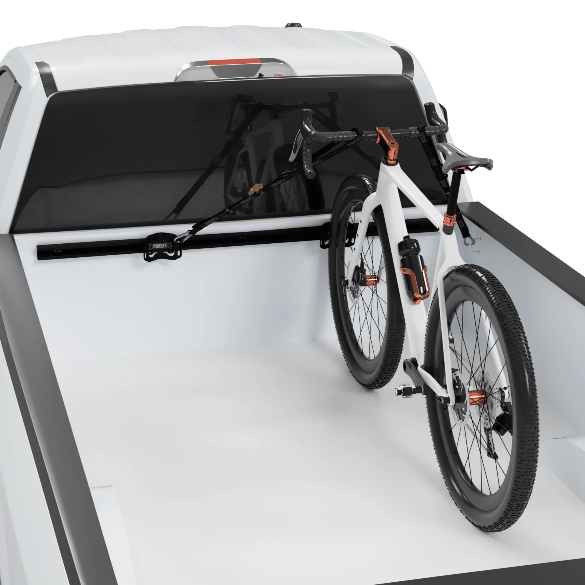 RIDE88 Cinch truck bed bike rack with Utility Track mounted in a truck bed holding a bike using tie-down straps
