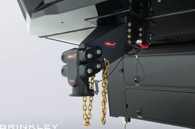 Close-up of a GEN-Y Executive Torsion Flex Fifth Wheel Pin Box on a Brinkley RV Model Gx, featuring a heavy-duty 30K gooseneck hitch option
