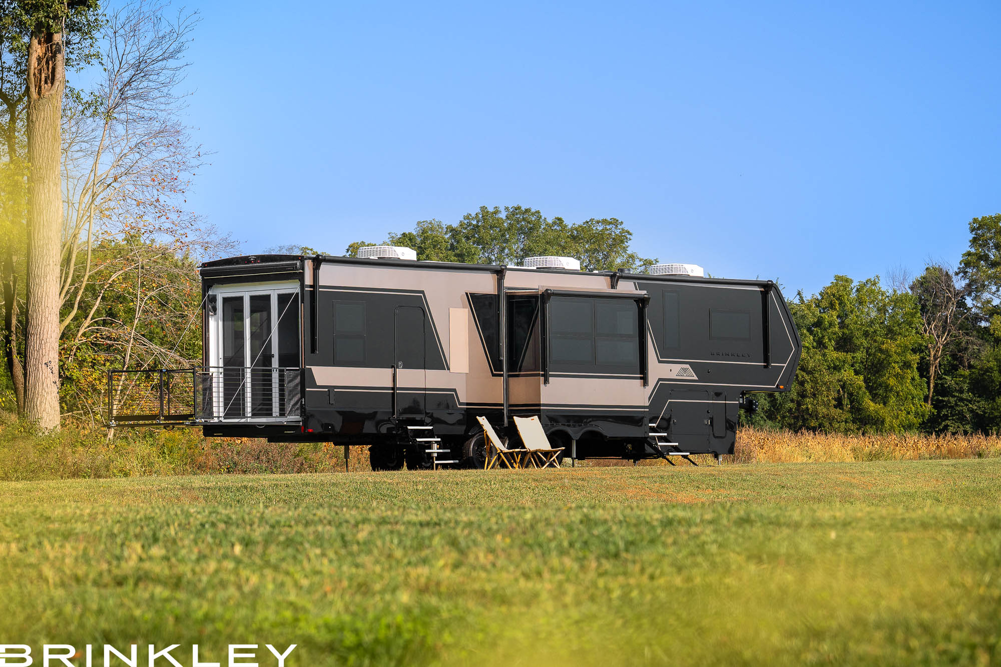 Brinkley Model G Luxury Fifth Wheel Toy Hauler in Premium Exterior with Premium Exterior w/ Gold & Black Paint